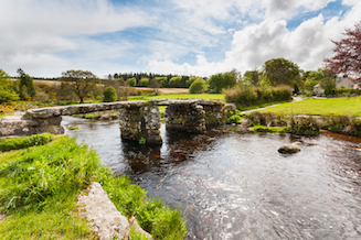 Clapper bridge at Postbridge in summer